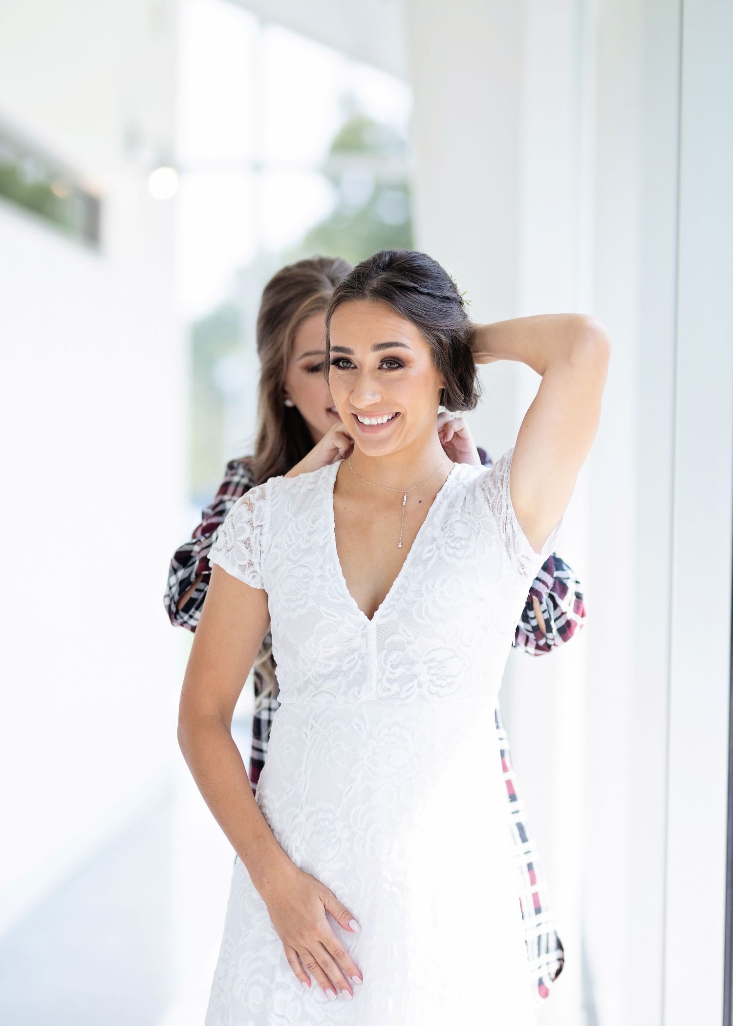 Bride getting ready with Maid of honor