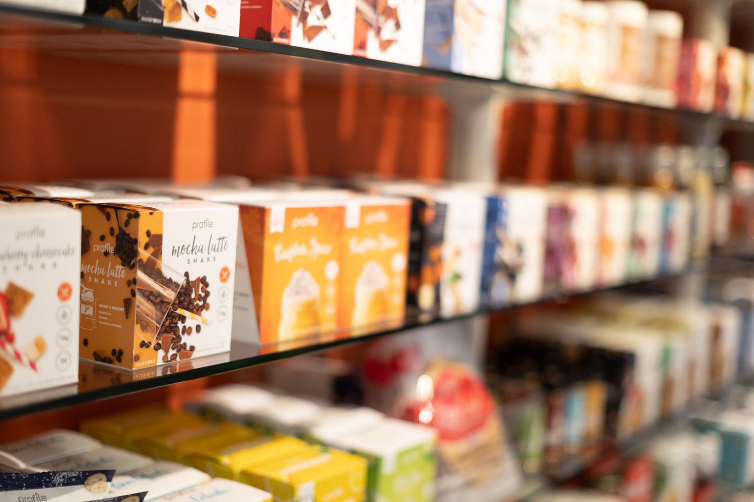 Retail shelving displaying rows of packaged food products.