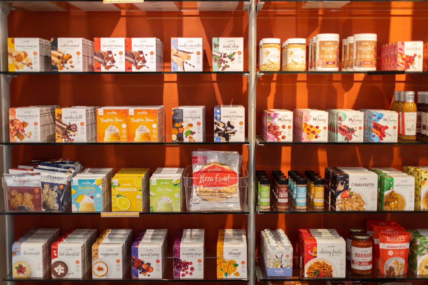 Store shelves stocked with various tea and beverage packages.