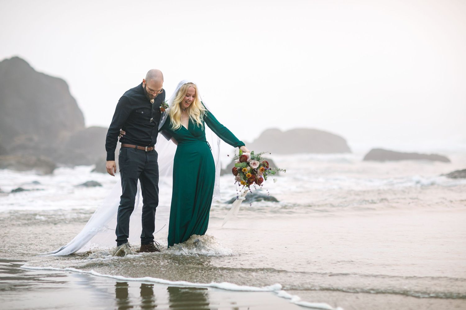Arche Creative Oregon coast elopement bride and groom beach trash the dress