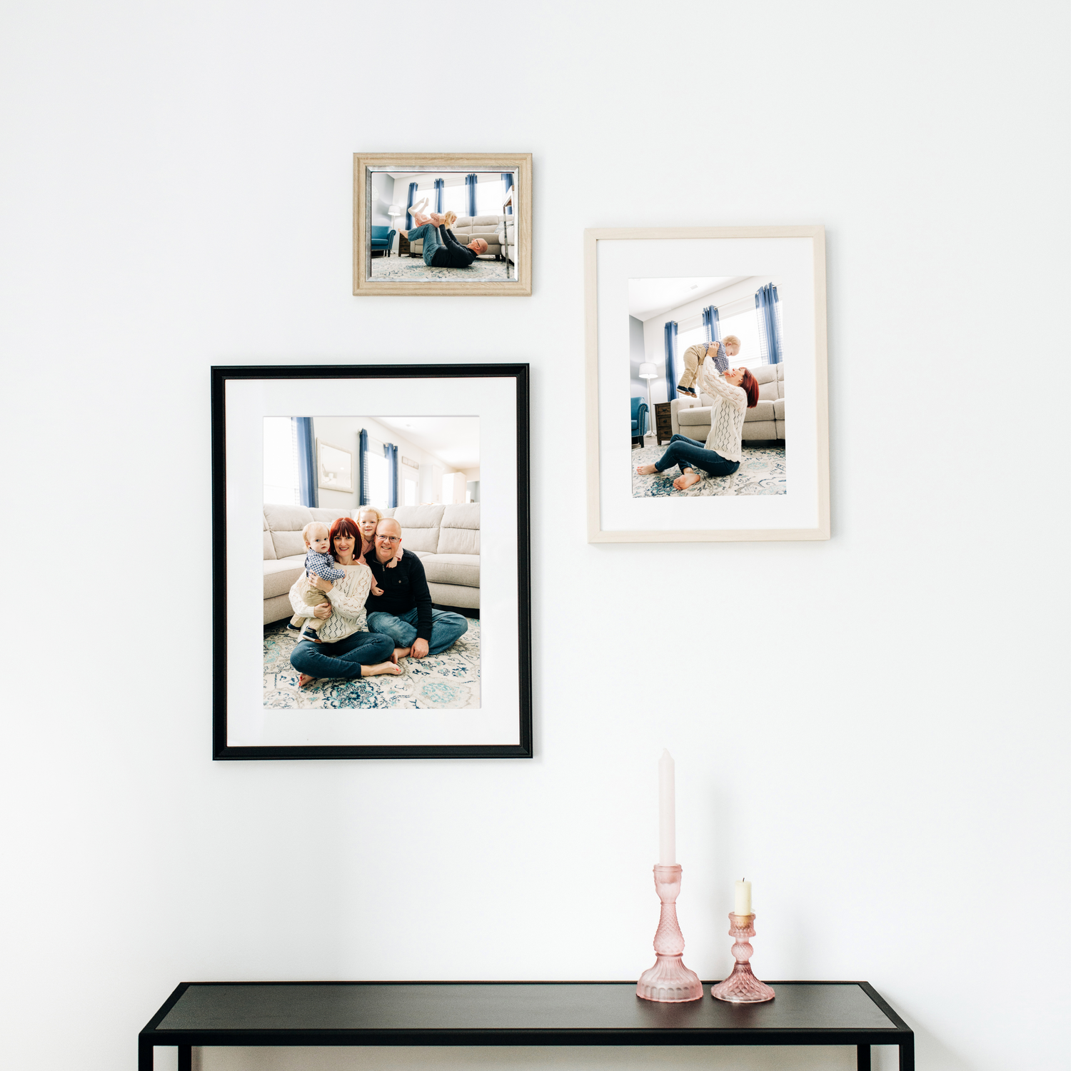 Family portraits hanging on a wall