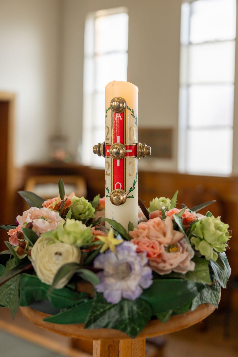 Church candle. Photo by Casual Captures Wedding Photography