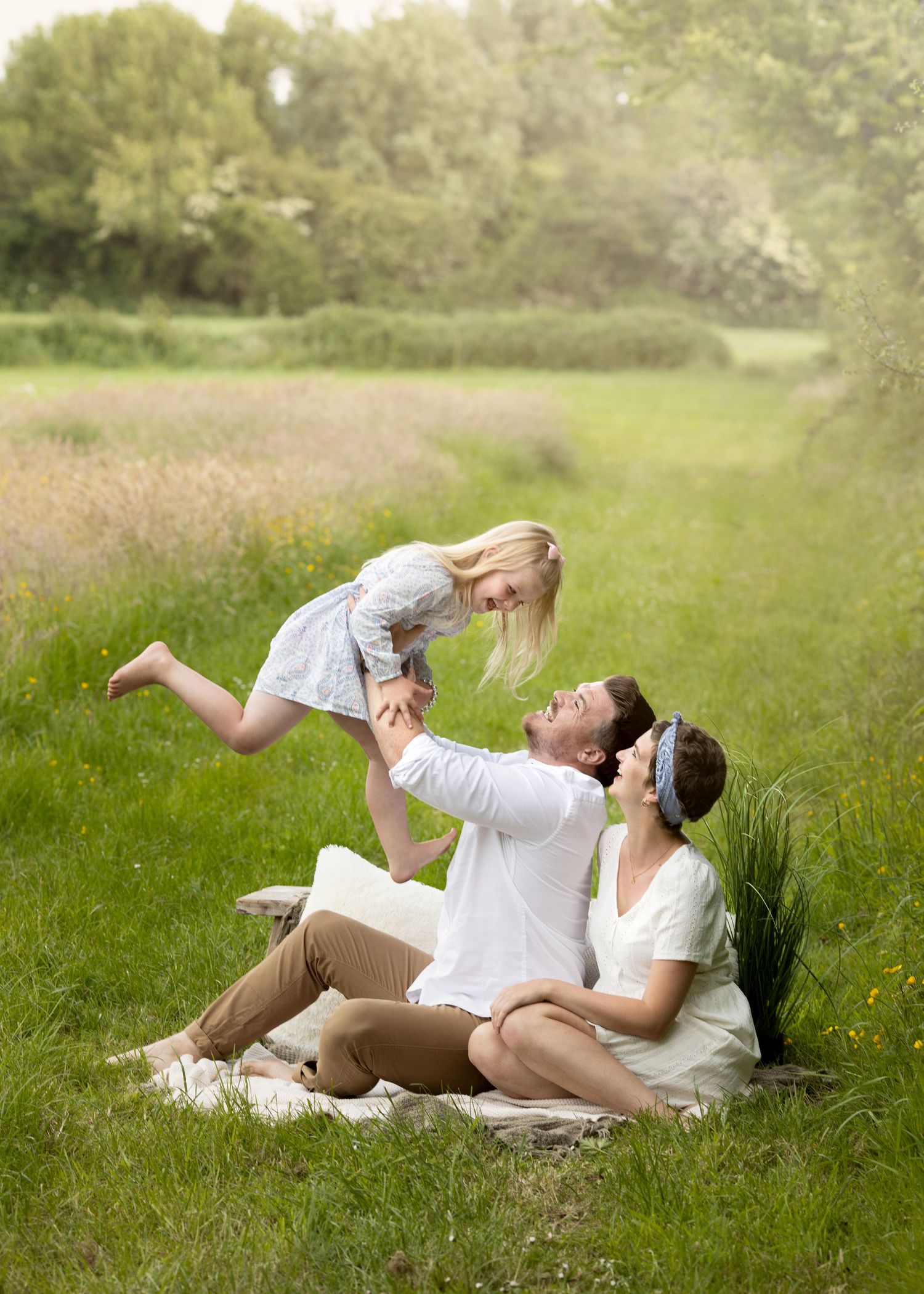 outdoor family baby photos in field  simple timeless