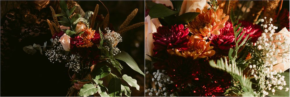 Rich red and pink floral arrangements photographed in dramatic dark lighting.