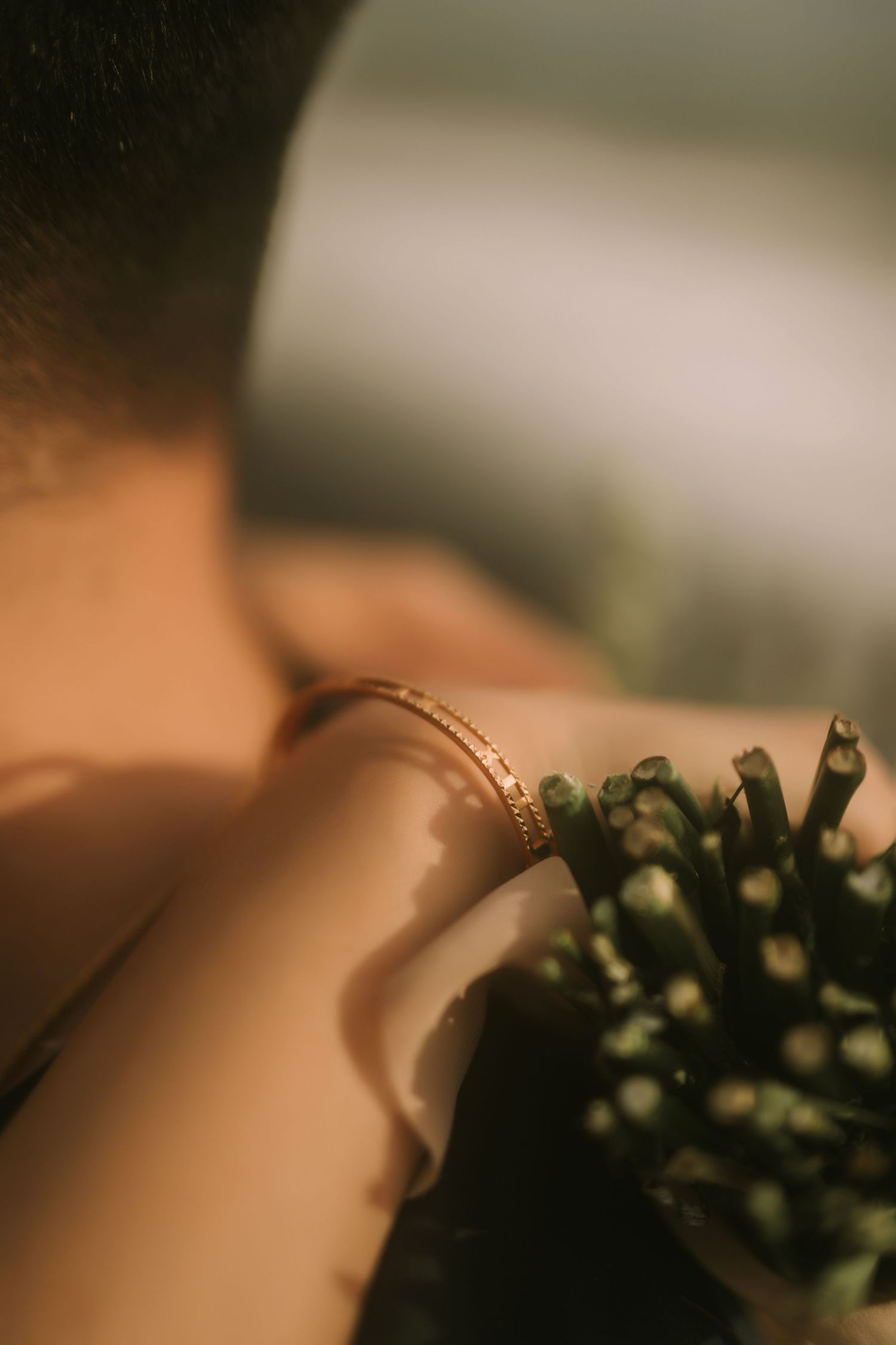 Delicate bouquet details with soft focus and warm tones.