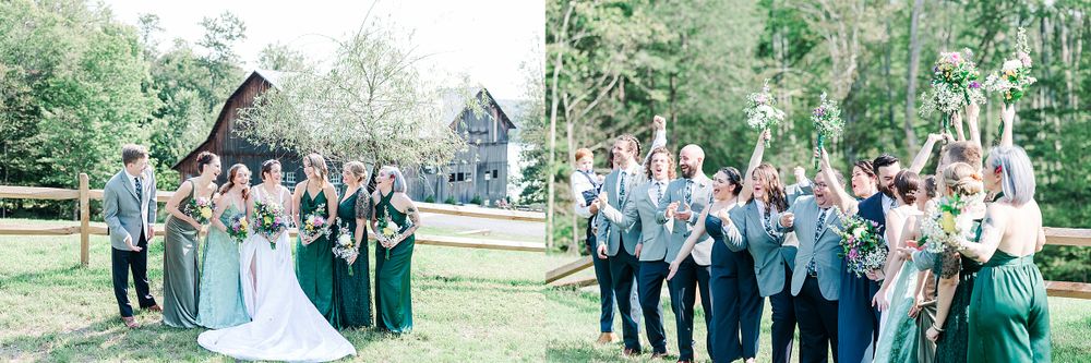 Wedding party celebrates joyfully outside rustic barn venue.