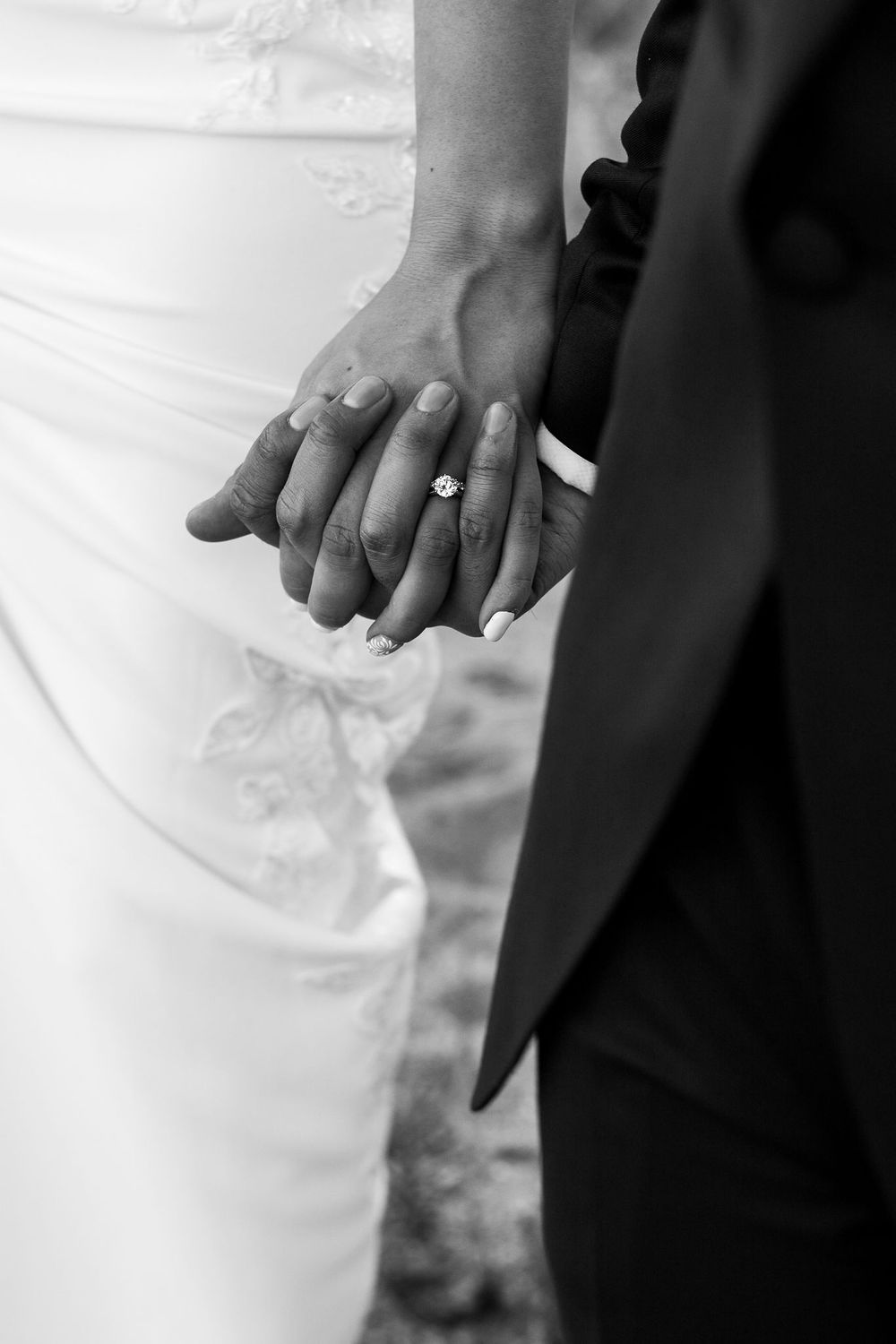 detail of a couple holding hands