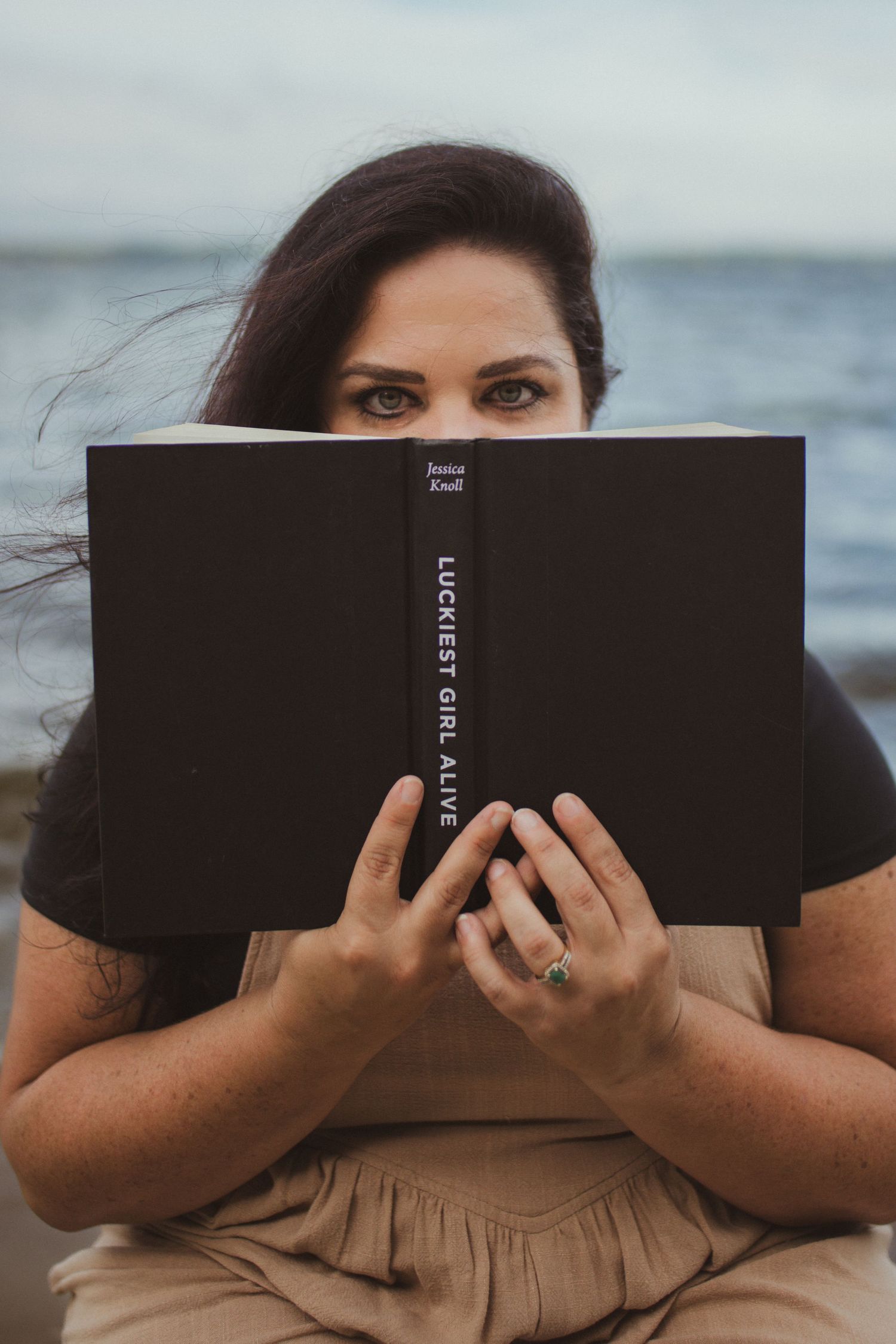 Woman looking over book editorial style photography. Captured by Maryland Photographer Mallory Bramlett.