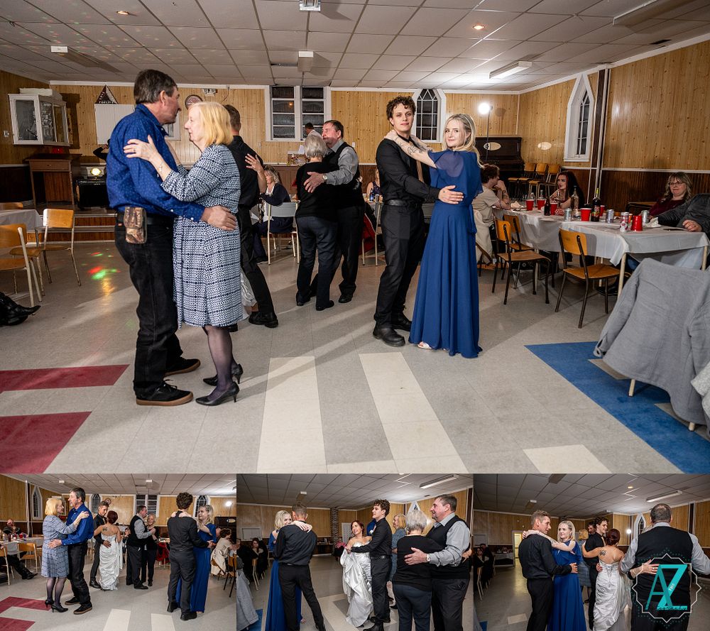 Couples dancing together at a formal event in a community hall with wood paneled walls and checkered floors.