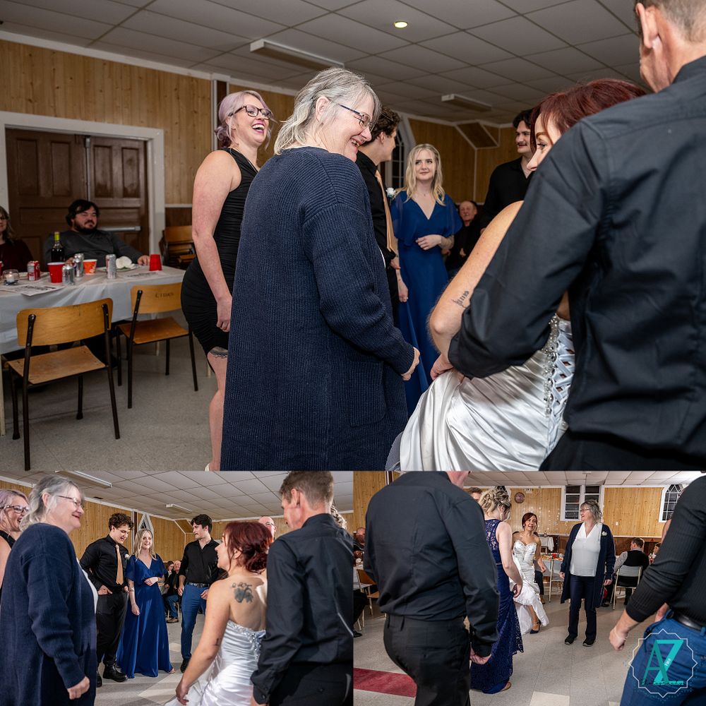 People gathered in formal attire at a social event in a wood-paneled reception hall.