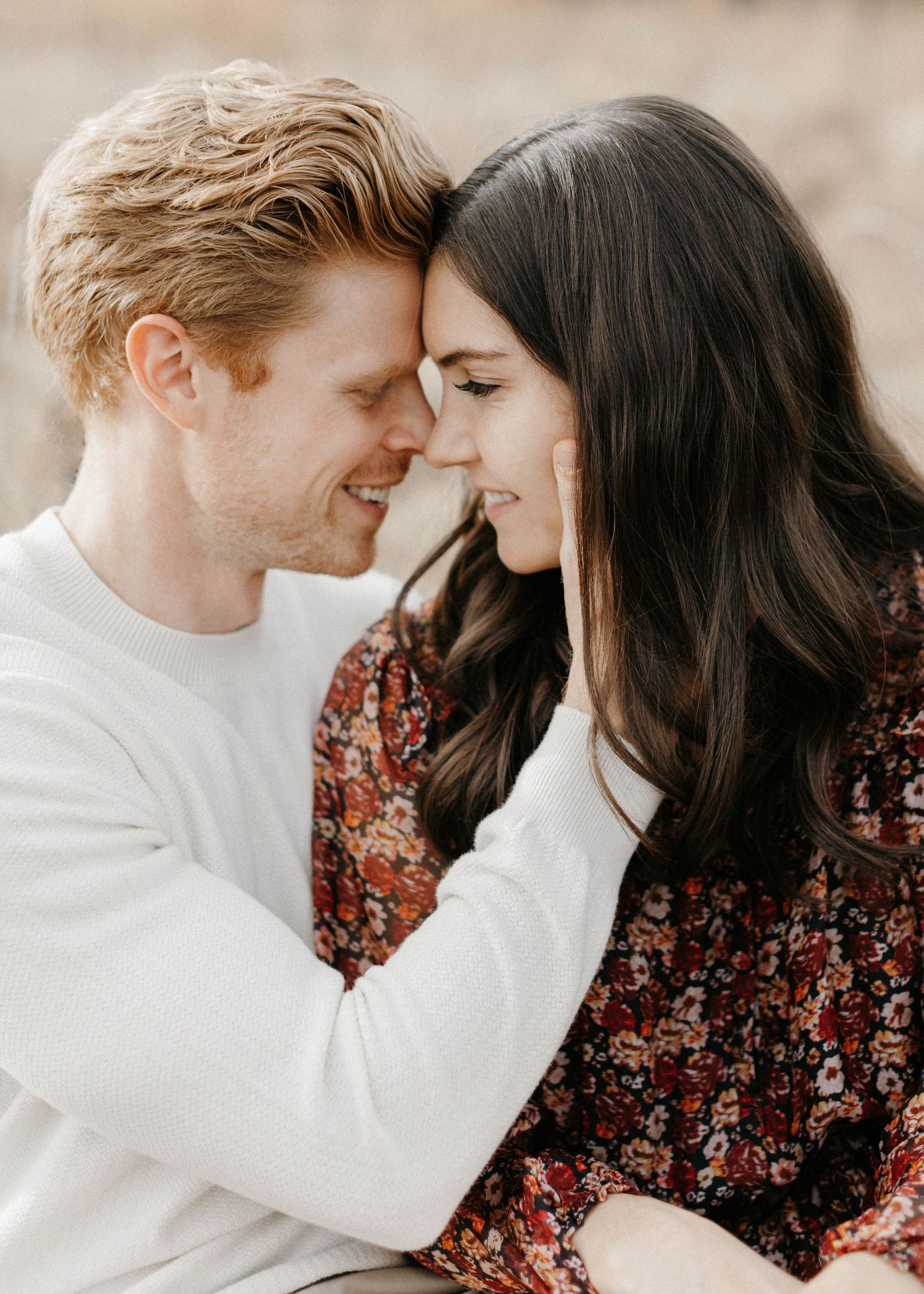 Intimate couple sharing tender moments in a romantic photo series.