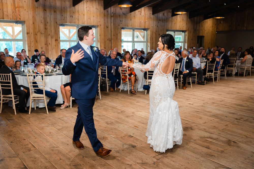 Bride and groom dance during wedding at Jorgensen Farms in Westerville, Ohio.