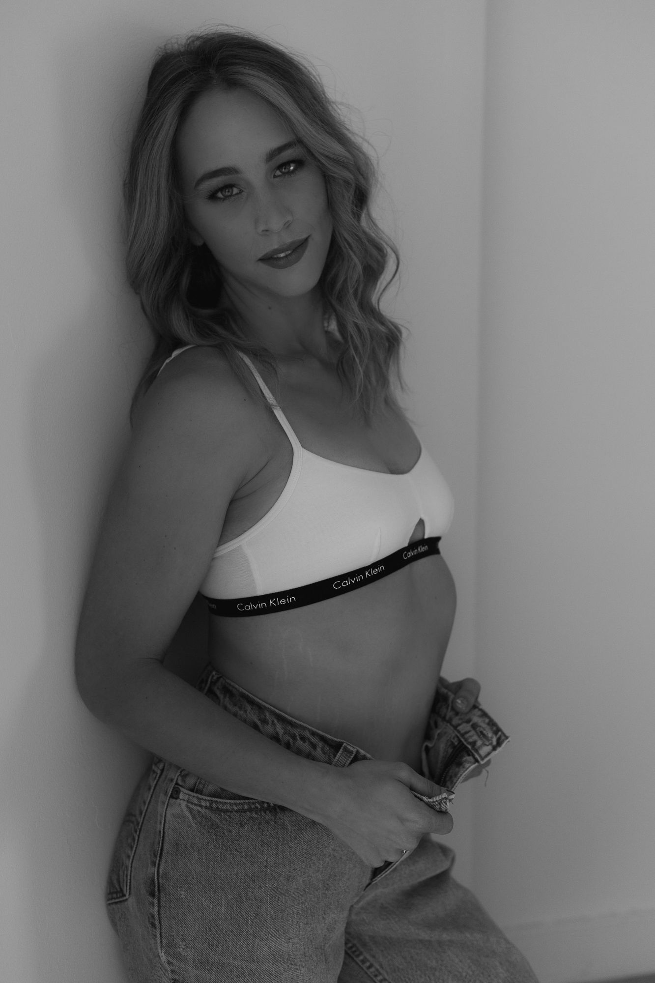 Model in cozy Calvin Klein for comfy boudoir session, Barrie Boudoir Photographer, Collingwood ON