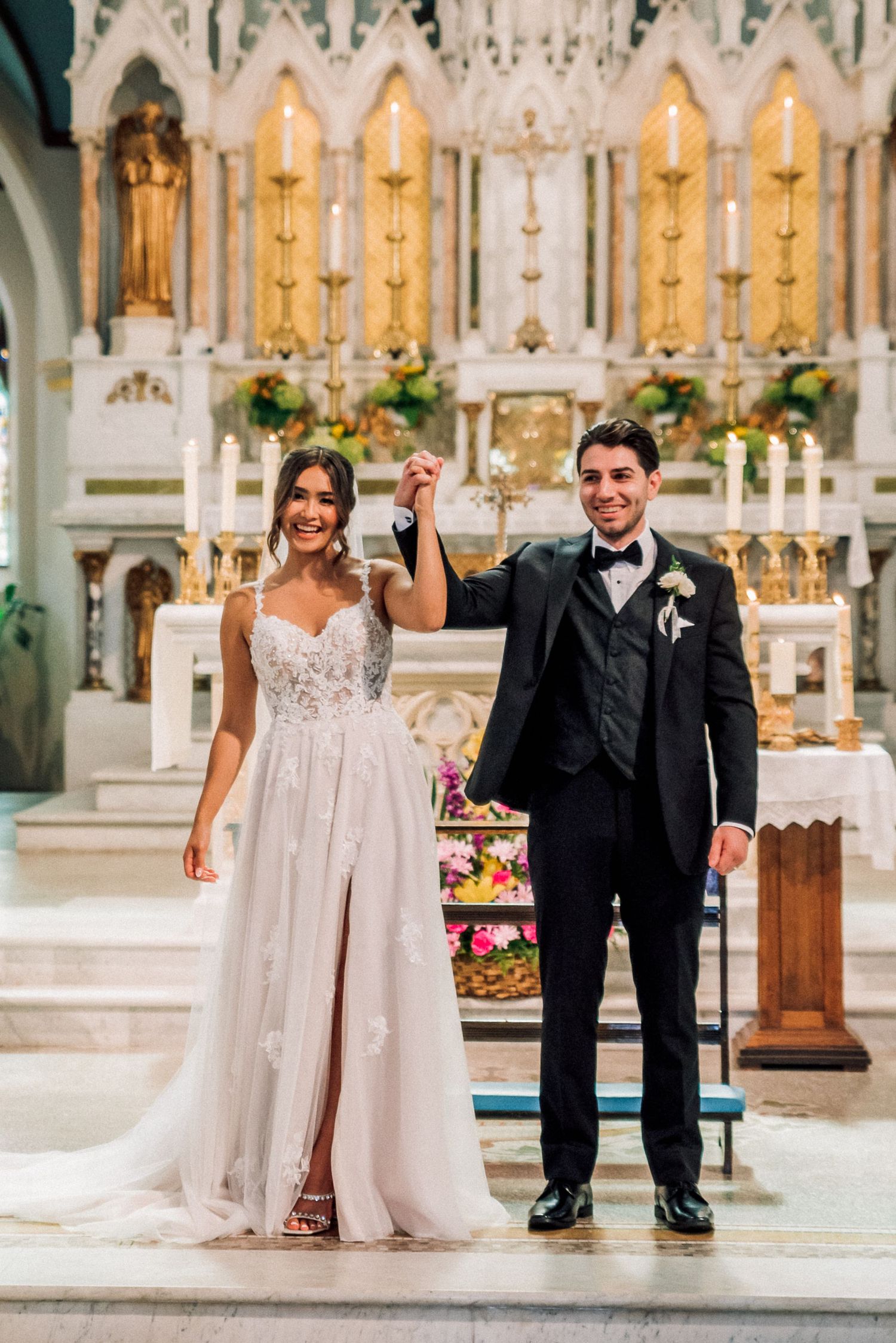 a beautiful catholic wedding ceremony at the Basilica of Our Lady Immaculate church in Guelph