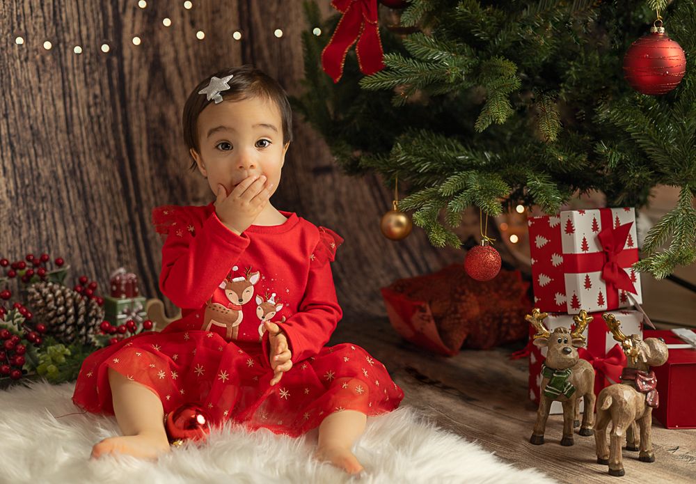 Cute baby girl Christmas photo in studio