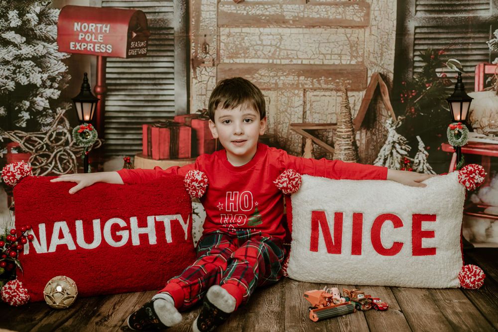 naughty or nice christmas decoration and little boy