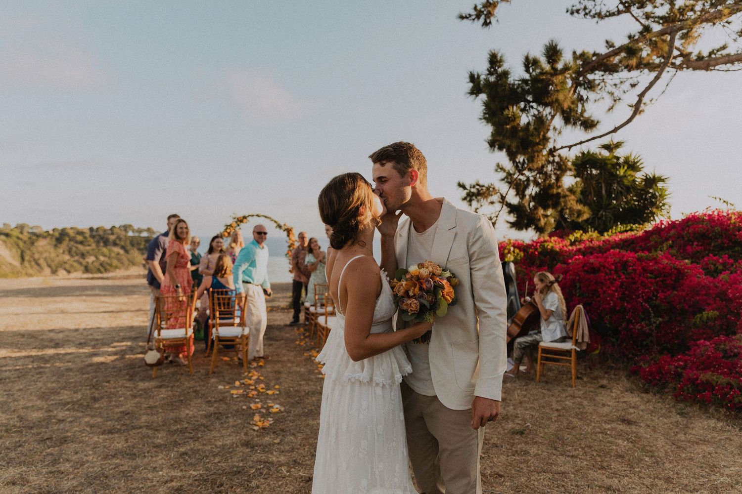 Bride and groom in Palos Verdes cliffs wedding overlooking the ocean