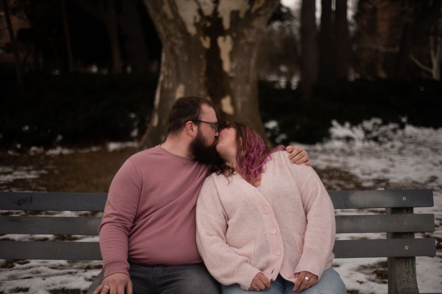 couple sitting on bench
