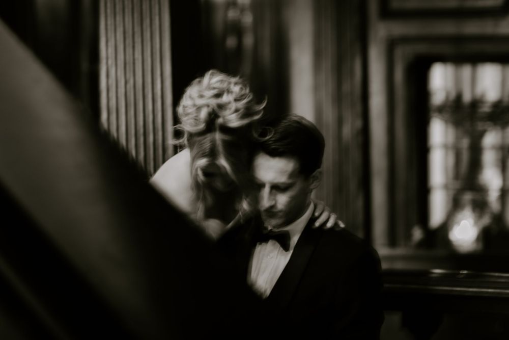 Artistic black and white intimate wedding portrait in classic vintage style.