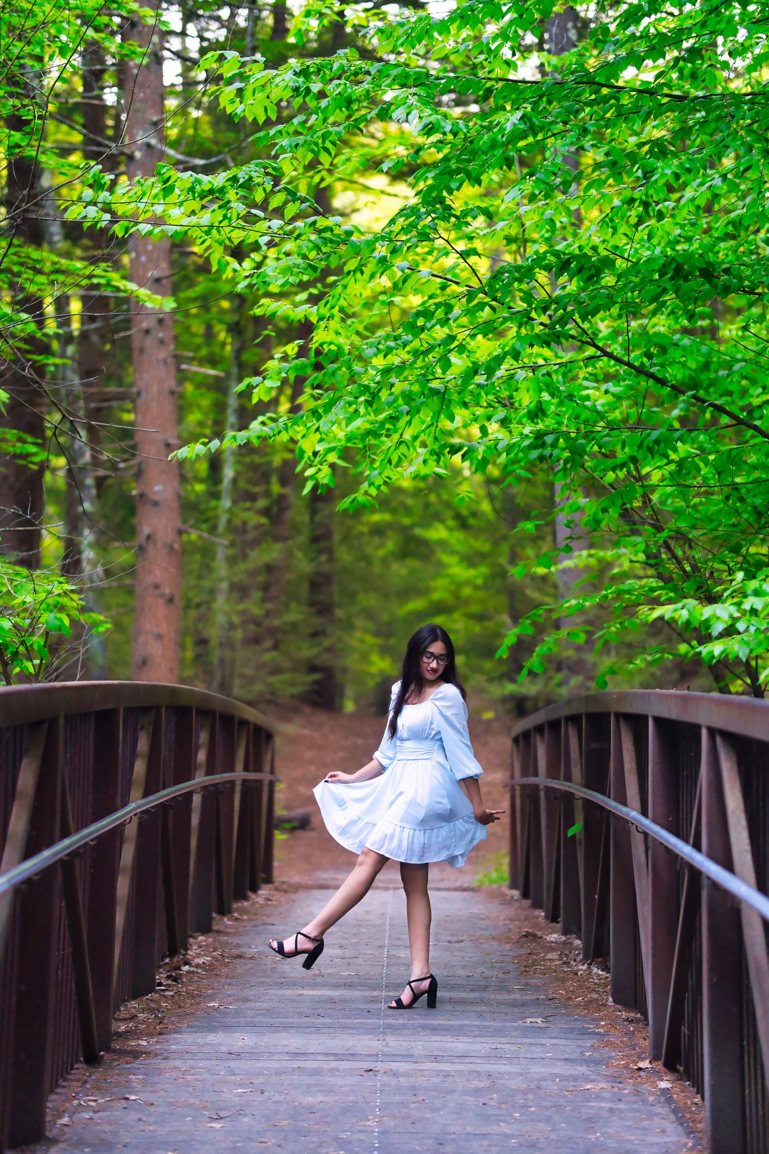 Spring Senior photoshoot on a beautiful bridge
