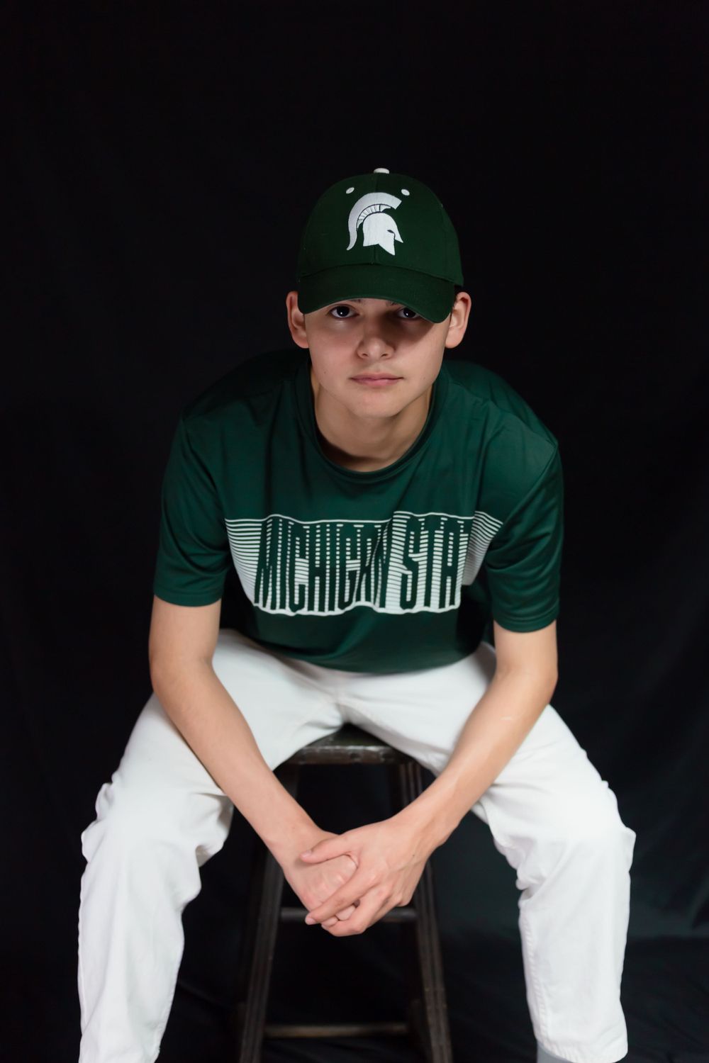 Male High School Senior with a baseball hat
