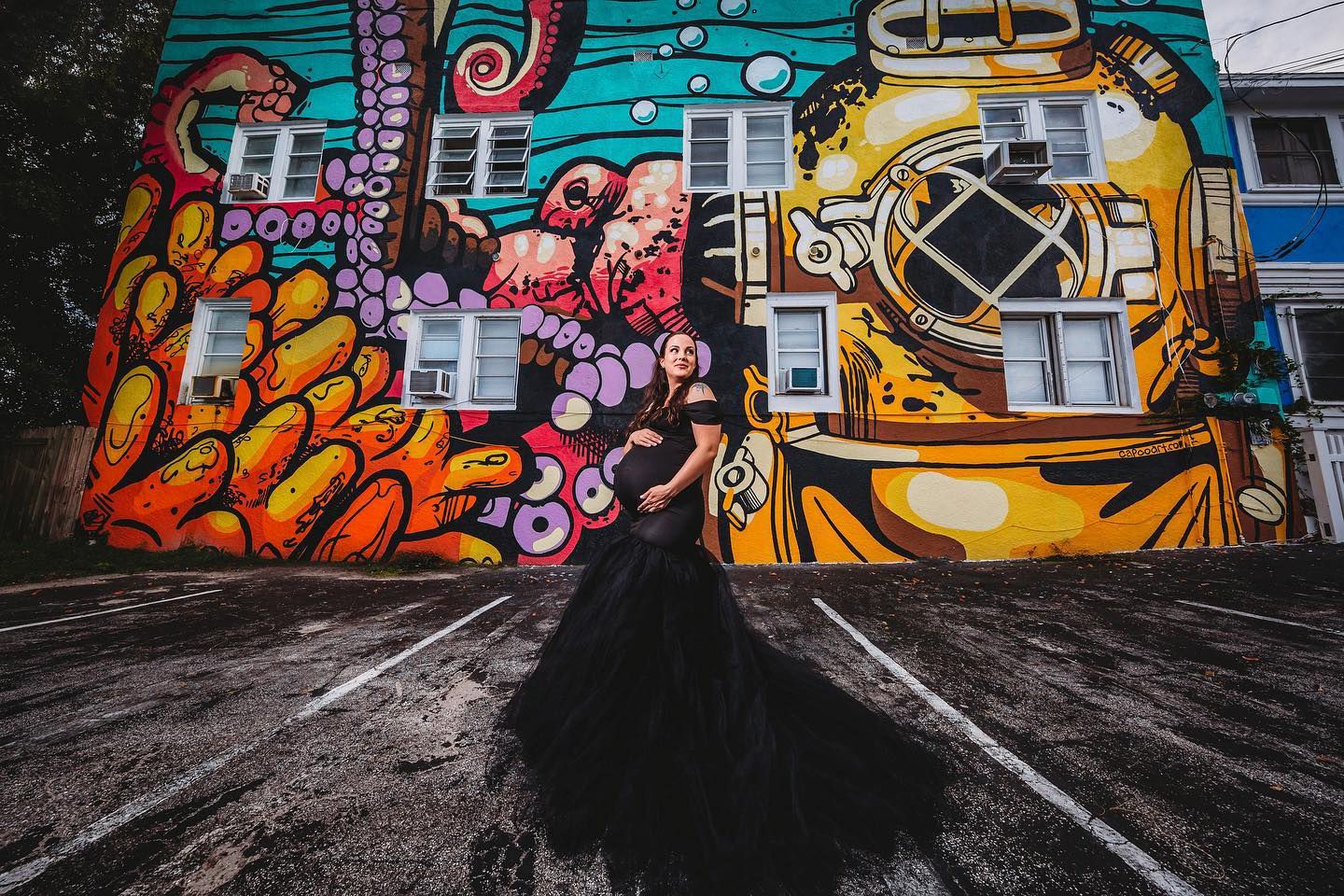 Vibrant urban graffiti mural featuring colorful designs and mechanical elements.