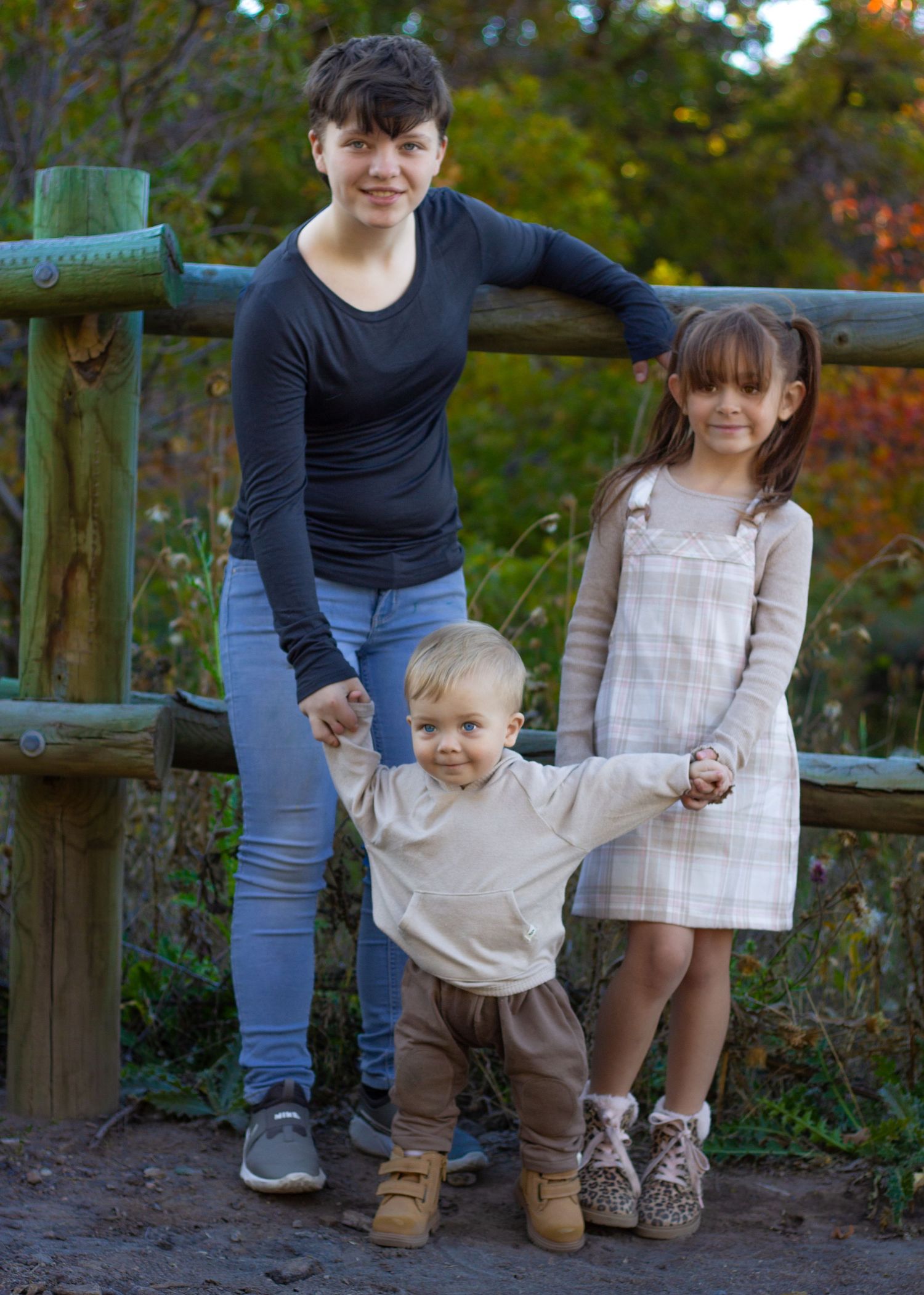 Image of siblings at Yellowfork Canyon, Herriman, Utah. During the Fall season.