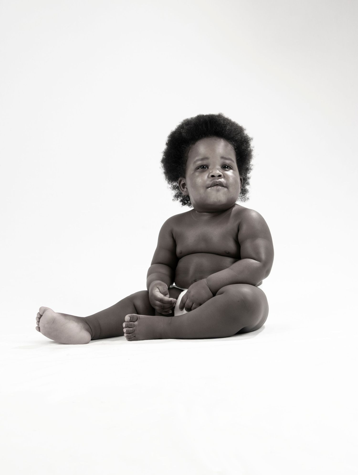 Child portrait photography in black and white.