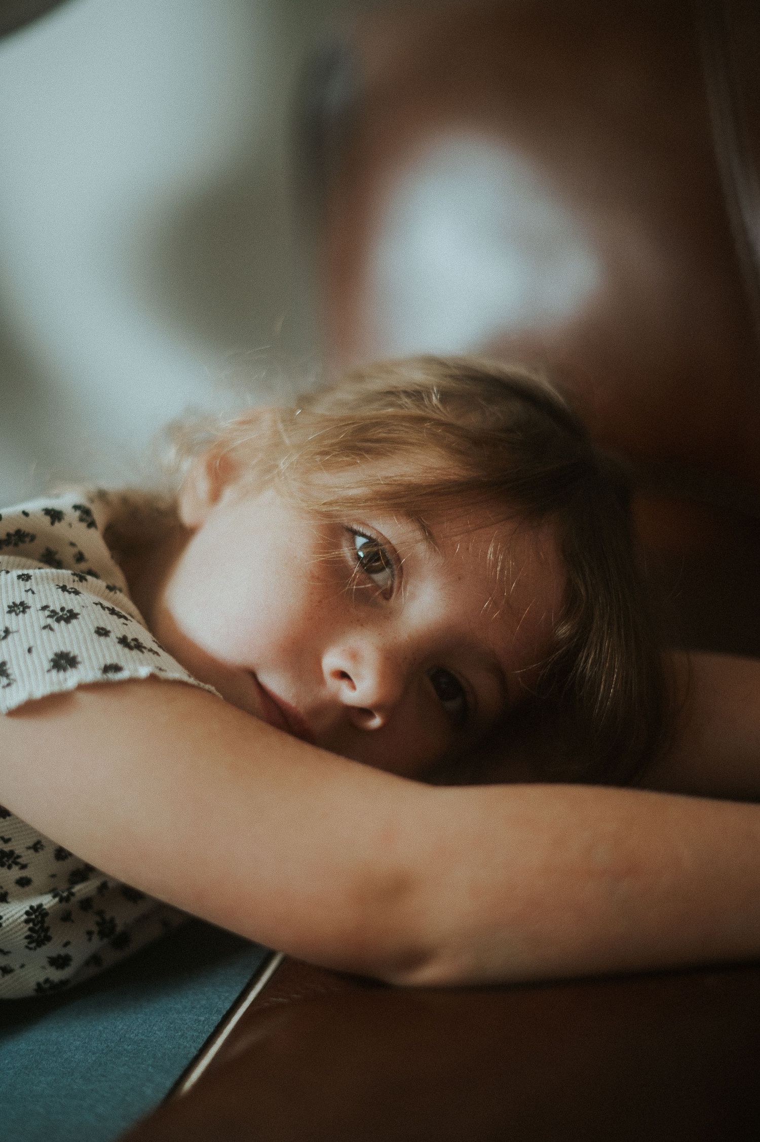 Close-up portrait with soft natural lighting and dreamy atmosphere.