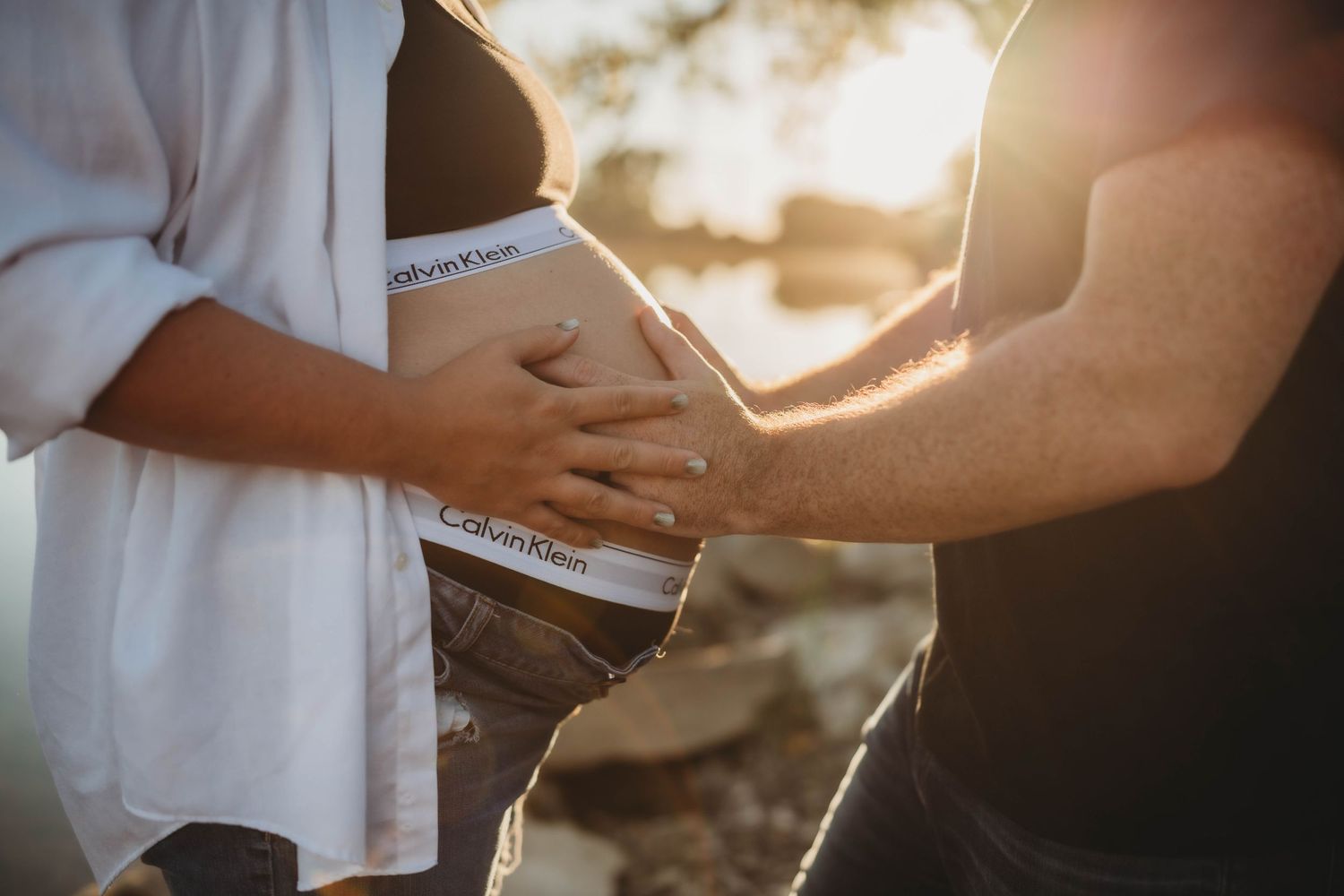 maternity photo, golden hour, Calvin Klein maternity, by the water