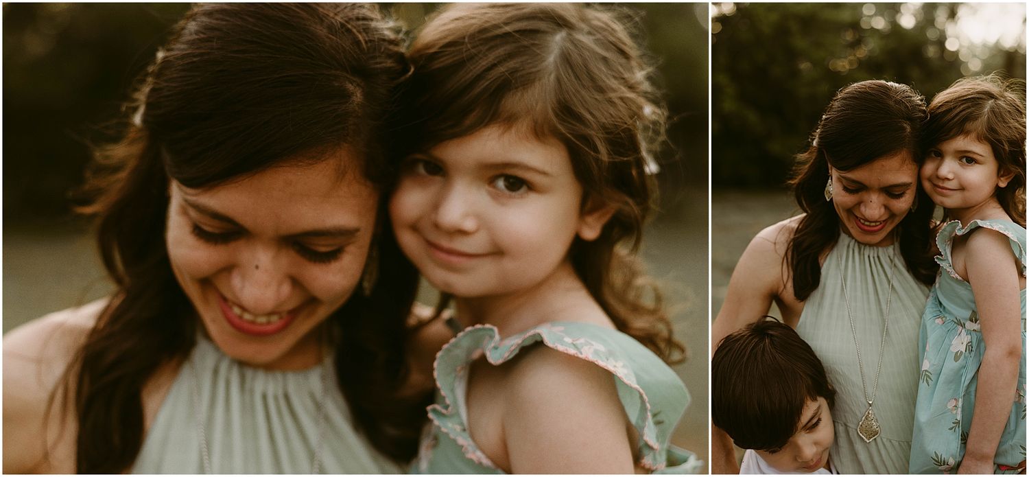 A sweet candid moment captured between parent and child during an outdoor portrait session.