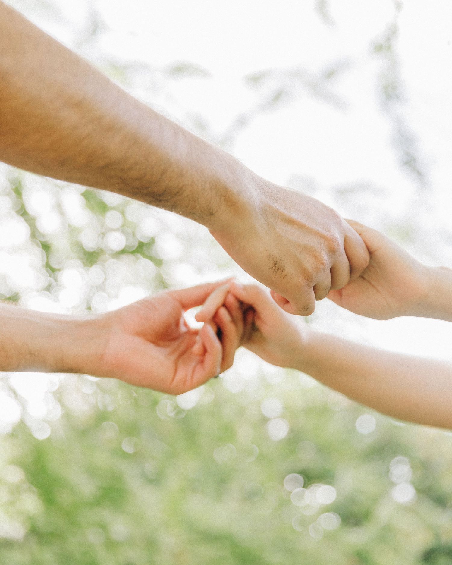 couple holding hands, close up detail shot, couple photoshoot inspiration