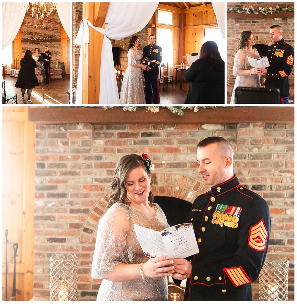 Marine groom and bride exchange vows and read from booklet in front of brick fireplace at wedding.