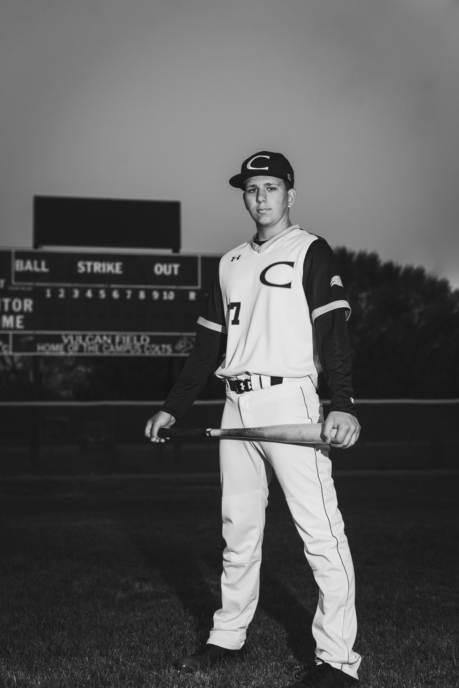 Campus Haysville high school senior pictures at baseball field - Derby, Wichita, KS photographer