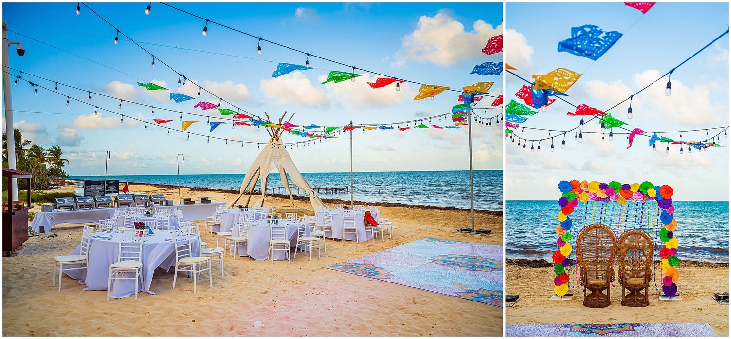 Beachside wedding reception setup with colorful flags and white chairs overlooking the ocean.