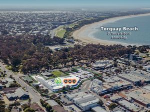 Bird's eye view of Torquay Beach shopping district and surrounding neighborhoods.