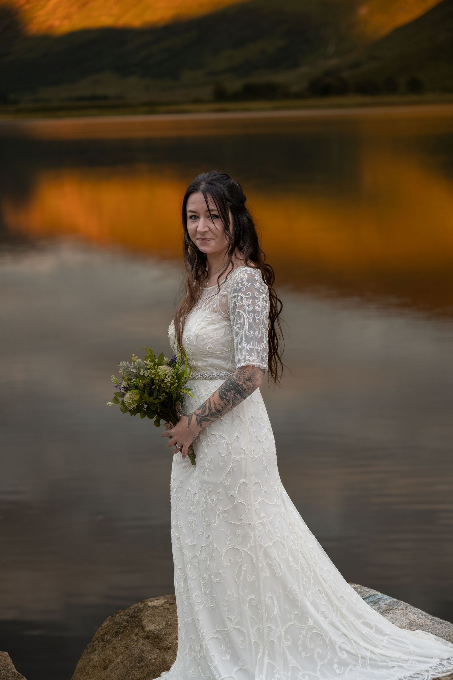 Wedding Bride and her bouquet, stood by Loch Etive, near Glencoe - Gavin Horrell Photography