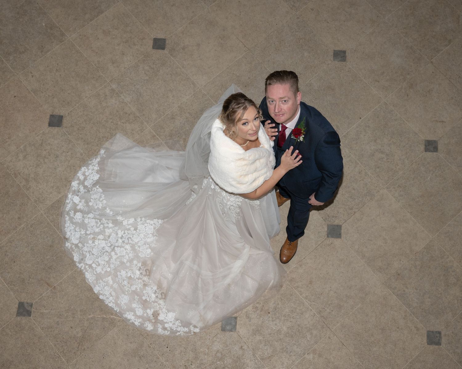 Aerial shot of Bride and Groom showing wedding dress train - Gavin Horrell Photography
