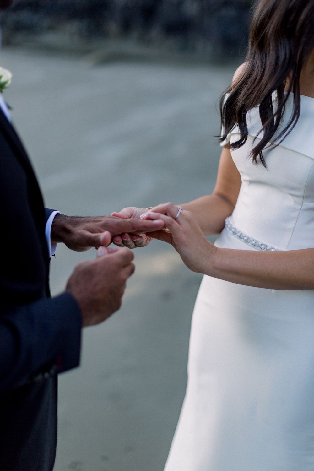 Exchanging rings during the wedding ceremony.