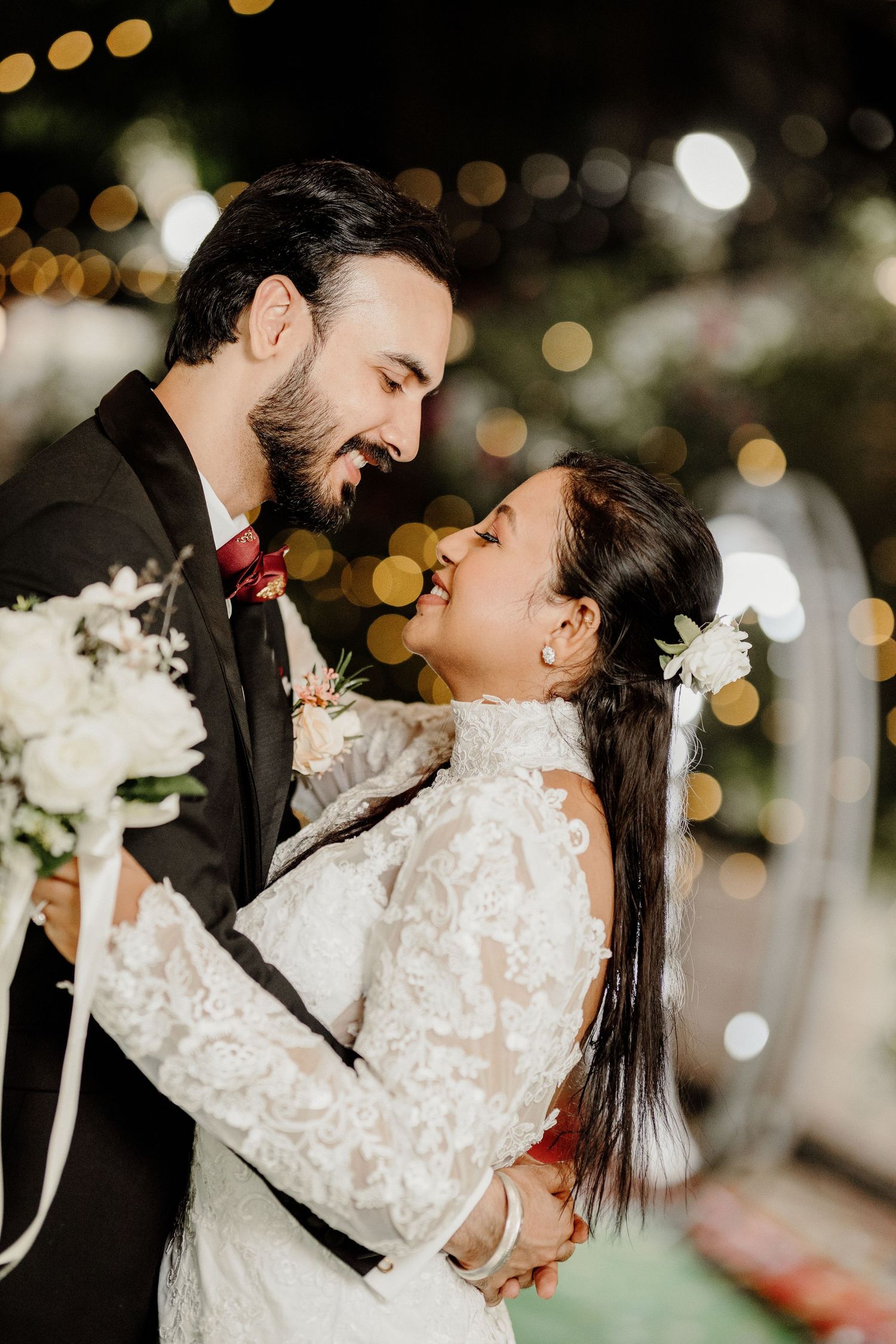 Candid wedding photography sequence showing intimate moments under fairy lights.
