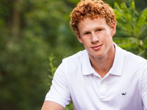 senior boy with curly red hair