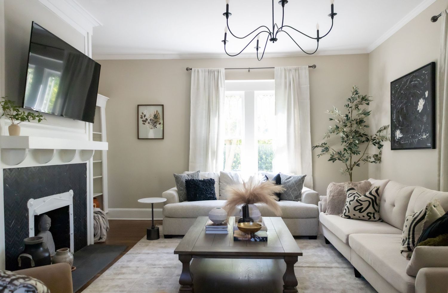 Contemporary and stylish living room showcasing a chic color palette, modern furniture pieces, artistic decor.
