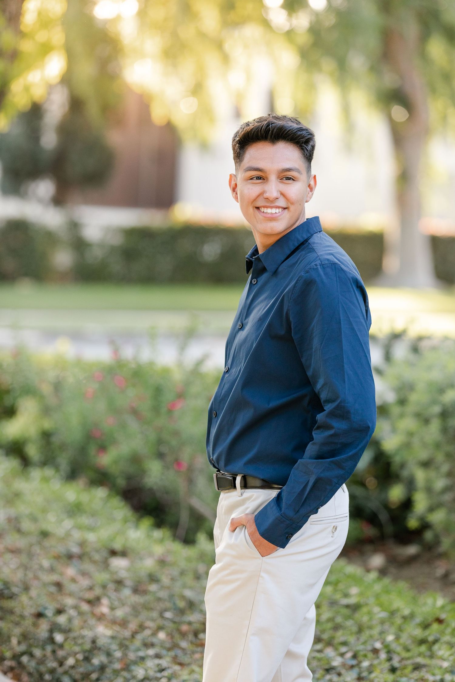 college guy senior portrait ideas wear blue shirt tan slacks