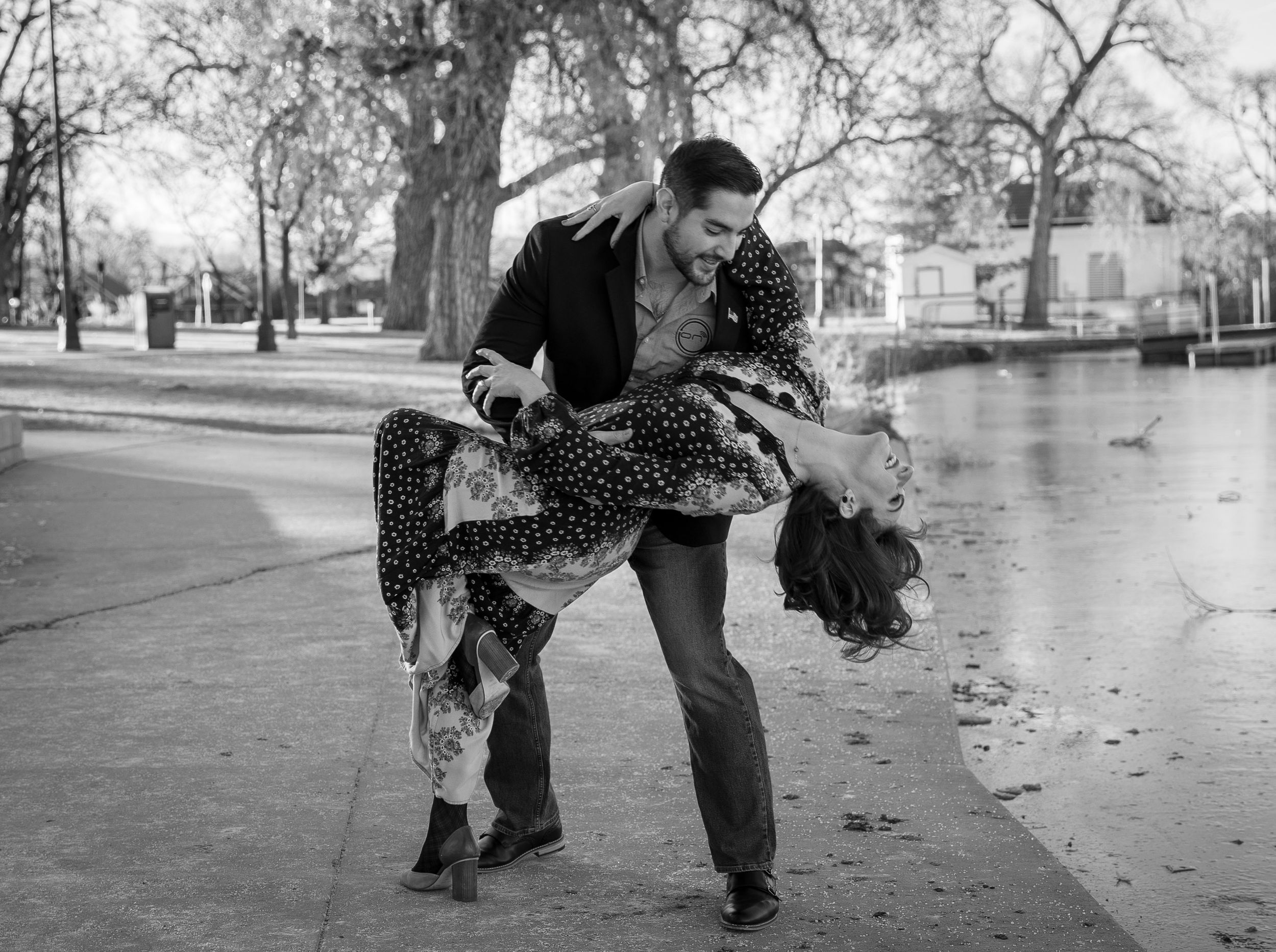 Outdoor engagement photoshoot in Denver Colorado. Engaged couples dancing in the park.