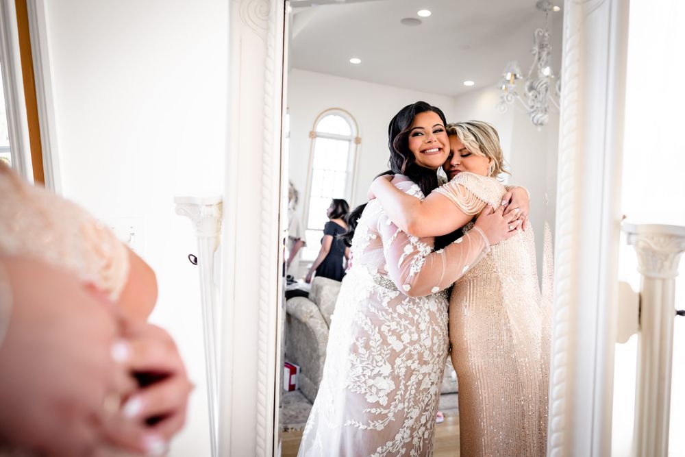 Candid moments captured in bright natural light during wedding preparations.
