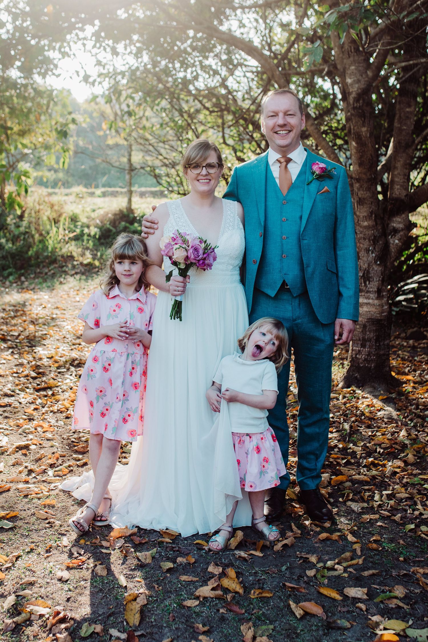 Bride and groom and their daughters
