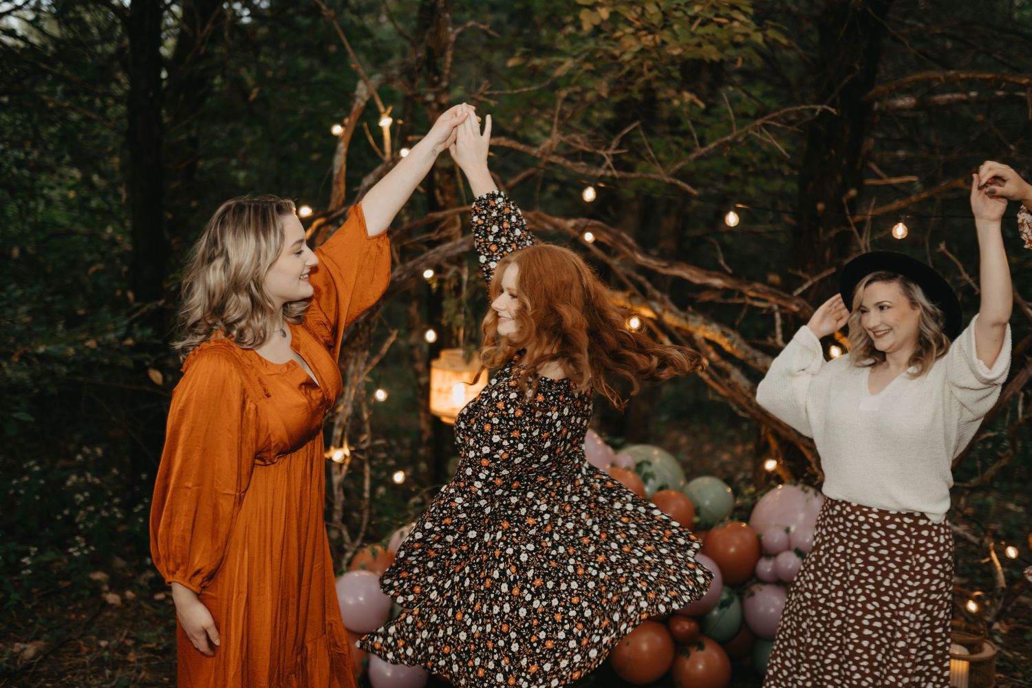 ladies dancing and playing games at bachelorette party, bridal shower