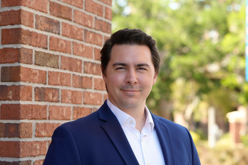 Professional headshot of businessman in downtown Tampa, FL.
