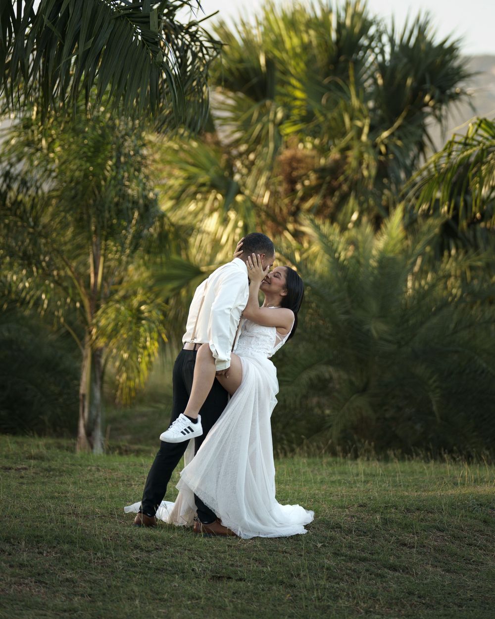 Romantic wedding photo sequence in a tropical garden setting during golden hour.
