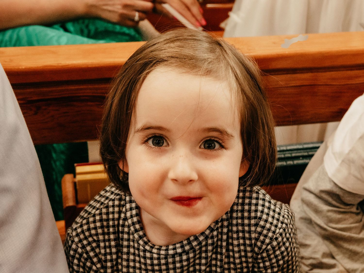 Little girl playing at communion